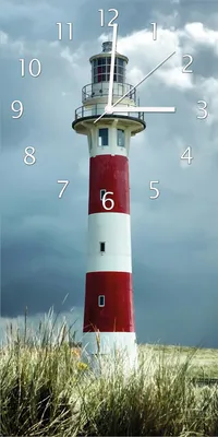 Produktbild von Wallario Design Wanduhr bedruckt, Größe 30 x 60 cm, Motiv: Leuchtturm am Strand