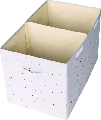 An empty, two-compartment storage bin with a speckled pattern.
