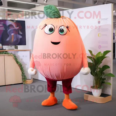 Productafbeelding van Peach Beet mascotte REDBROKOLY kostuum karakter gekleed met een legging en dasspelden