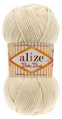 A ball of cream-colored yarn with a label around it.