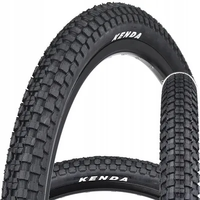 Two bicycle tires are shown, one in the foreground and one behind it.