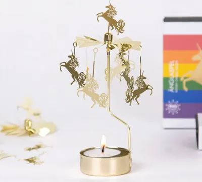 Zdjęcie produktu dla Karuzela na tealighty z jednorożcem - wzór Pluto