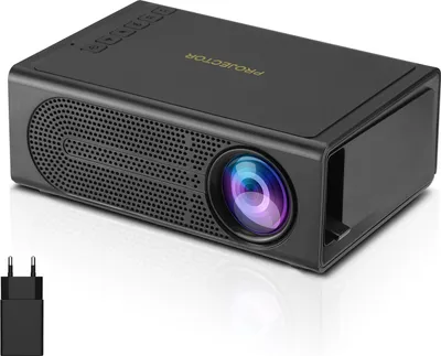A black mini projector is shown on a white reflective surface.