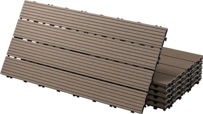 A stack of interlocking WPC decking tiles, some laid out flat and others stacked vertically.