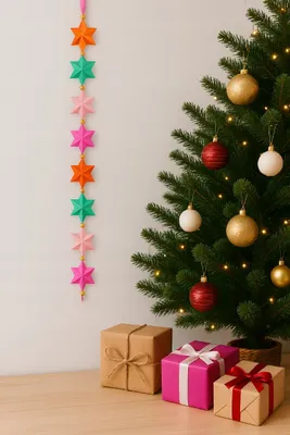 Imagen del producto de Guirnalda navideña con forma de estrellas, de colores, de 270 cm de largo
