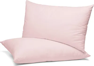Two pink pillows stacked on a white background.