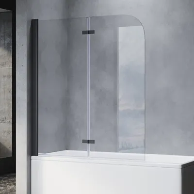 A black framed, clear glass shower screen attached to a white bathtub.