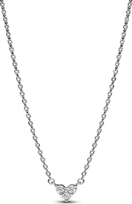 A silver necklace with a heart-shaped pendant.