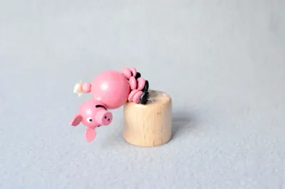 Produktbild von Holzspielzeug Wackeltier Schwein Höhe 7,5cm NEU