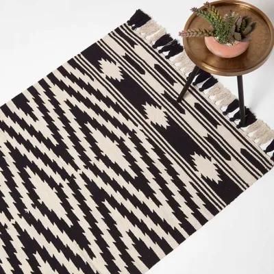 Produktbild von HOMESCAPES Handgewebter Baumwollteppich Dinan – schwarz-weiß gemustert, 120 x 170 cm