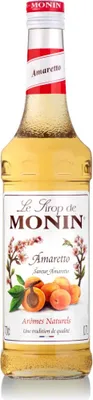 A bottle of Monin Amaretto syrup.