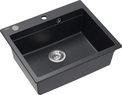 A black granite kitchen sink with a silver drain.