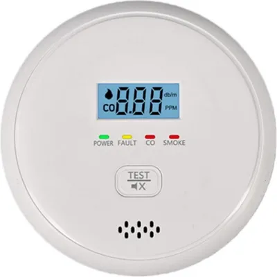 A white, round smoke and carbon monoxide detector is shown against a white background.