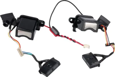 A set of two small black speakers with wires and connectors, isolated on a white background.