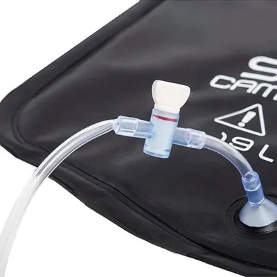 Close-up of a black water bladder with a clear tube and valve attached.