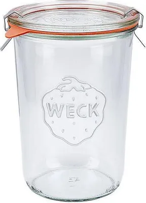 A clear glass jar with an orange rubber seal and metal clips, featuring the embossed 'WECK' logo in the shape of a strawberry.