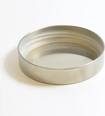 A stainless steel container with a lid, shown on a white background.