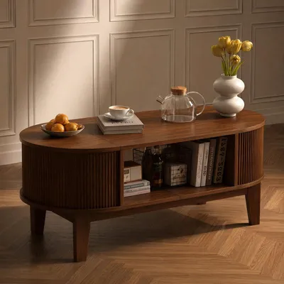 Produktbild von UnboxG Couchtisch Oval 100 cm Walnussoptik – Sofatisch mit 2 versteckten Staufächern, Soft-Close Scharnieren, offenem Ablageboden und modernem Rillendesign