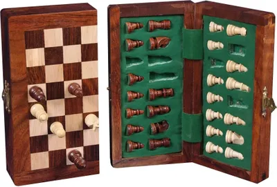 A wooden chess set is shown open, with the board on the left and the pieces stored in the right compartment.