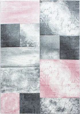 A flat lay image of a rug with a geometric pattern.