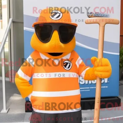Productafbeelding van Oranje REDBROKOLY ijshockeystick-mascottekostuum gekleed met een overall en zonnebril