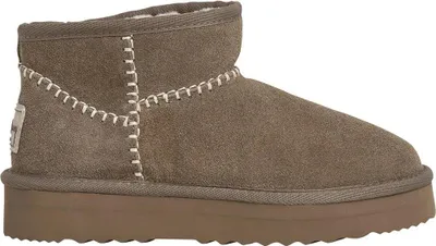 A side view of a single brown boot.