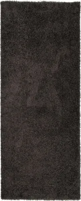 A dark, textured rug.