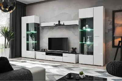 A modern living room with a media console and display cabinets.