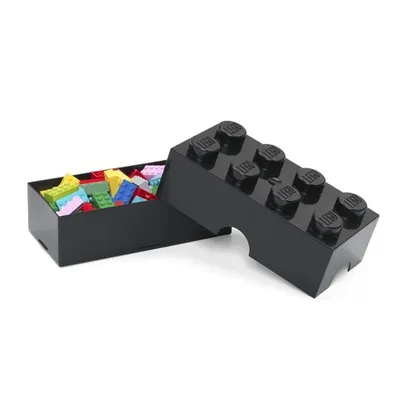 A black LEGO brick-shaped storage box with colorful LEGO bricks inside, shown with its lid open.