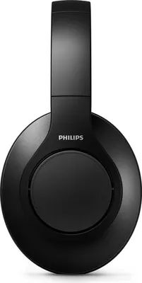 A black Philips over-ear headphone is shown from the front against a white background.