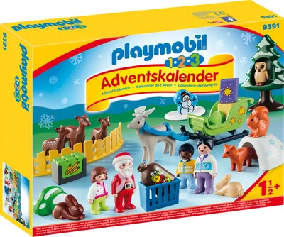 The image shows the front of a Playmobil 1.2.3 Advent Calendar box, depicting a winter forest scene with various Playmobil figures and animals.