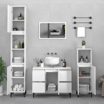 A clean, modern bathroom vanity with a sink, mirror, and storage cabinets.