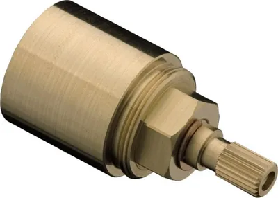 A close-up studio shot of a brass plumbing valve extension.