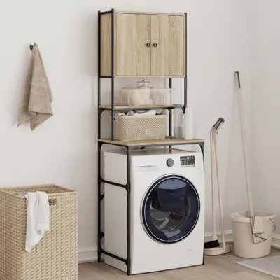 A washing machine with a laundry shelving unit and accessories in a room.