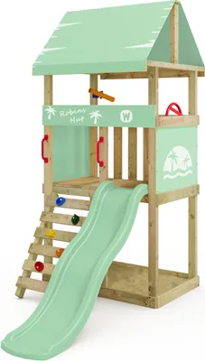 A pastel green wooden play tower with a slide, climbing wall, and sandpit.