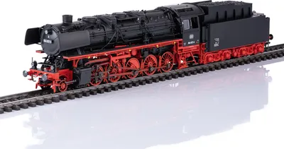 A detailed model of a black and red steam locomotive on a model railway track.