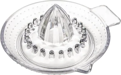 A clear plastic citrus juicer is shown from a top-down angle against a white background.