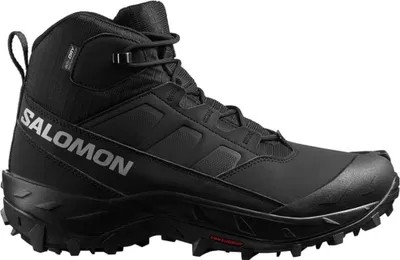 A black Salomon hiking boot is shown from the side against a white background.