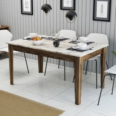 A dining table set up for a meal in a dining room.