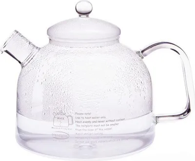 A clear glass teapot with water inside, sitting on a white background.