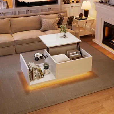 A modern living room with a couch, fireplace, and a lift-top coffee table.