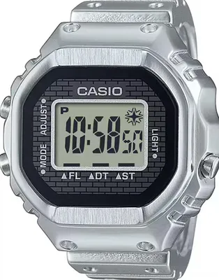 A close-up studio shot of a silver Casio digital watch.