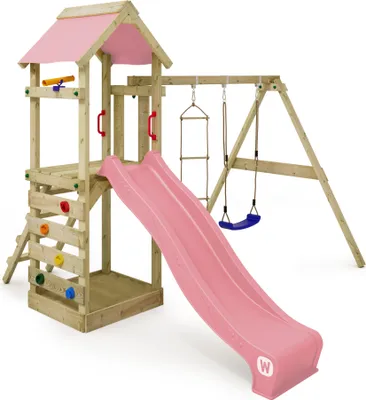 A wooden playground set with a pink slide and canopy, a swing, a climbing wall, and a sandpit.