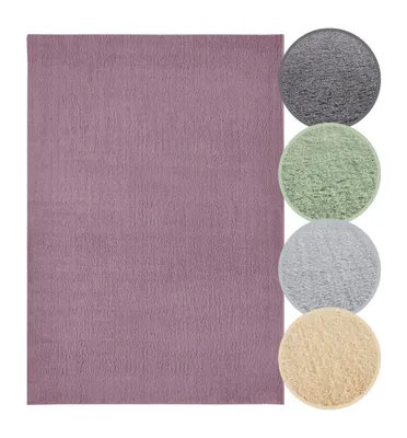 Weicher Hochflor Teppich in Lavendel mit Farbmustern in Anthrazit, Grau, Creme, Salbei.