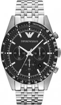 A close-up, front-facing studio shot of an Emporio Armani chronograph watch with a black dial and silver metal band, set against a white background.