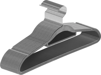 A stack of gray velvet hangers on a white background.