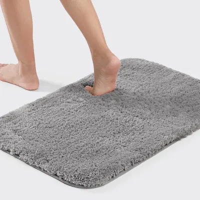 Produktbild von Badezimmerteppich - 40 x 60 cm - Mikrofaser - Hochflor - Rutschfest - Maschinenwaschbar - Grau
