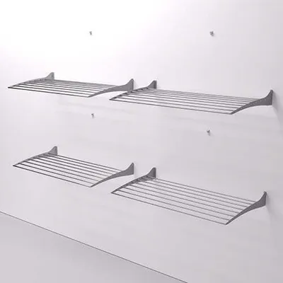Four wall-mounted drying racks are shown on a white wall.