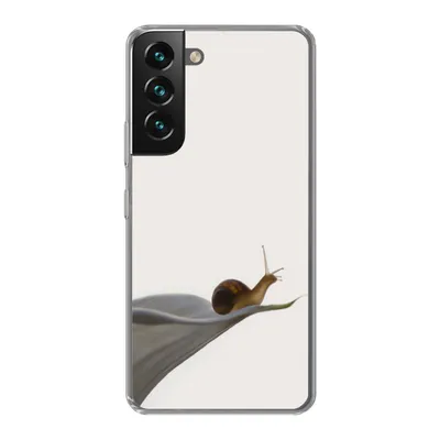 A clear, professional shot of a phone case with a snail on a lily pad design.