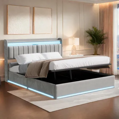Immagine prodotto di ProximaX Il letto 160x200 cm rivestito in velluto grigio è dotato di luci LED sulla testiera e sul giroletto, molle a gas incorporate, spazio per riporre oggetti sotto il letto e spazio per riporre oggetti nella testiera: un letto contenitore moderno.
